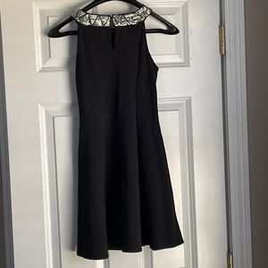 Girls Size Large Sleeveless dress with sequined trim neckline